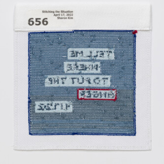 Reverse side of Apr 17, 2022 block. Photo by West Magyar Revere side of stitching, with information label on the top left