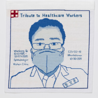 Cross stitch embroidered portrait of Dr. WenLiang Li. His name is stitched to the left of his image, along with "10/12/1985 - 02/07-2020 Ophthalmologist Wuhan China. In his portrait he is wearing thin rimmed glasses, a light blue mask, a white button down shirt and lab coat. His name is stitched in chinese on his coat. To the right of his image is written, "COVID-19 Whistleblower 12/30/2019. There is a pink square outlined in red with a red medical cross in the middle. Across the top of the image is written, "Tribute to Healthcare Workers"